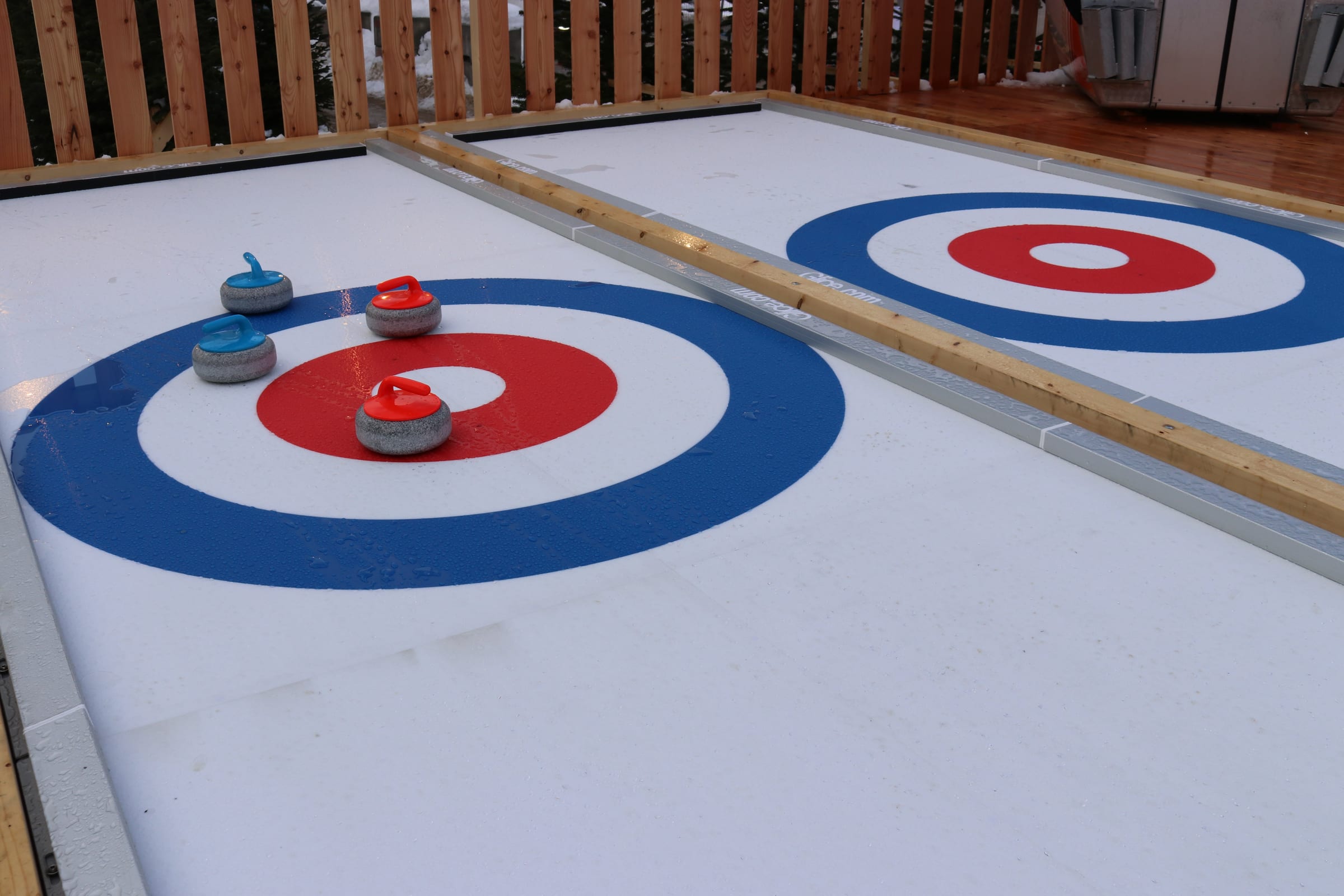 Glice synthetic curling lanes at the House of Switzerland during the 2026 Winter Olympics